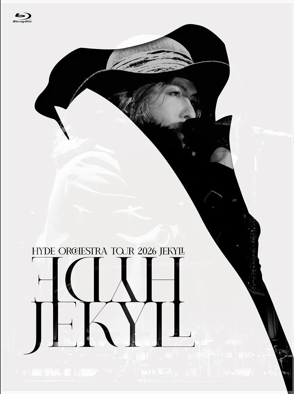 Portada de la edición limitada de HYDE Orchestra Tour 2026 JEKYLL: HYDE con sombrero de ala ancha y micrófono, en blanco y negro
